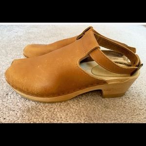 Leather clog peep toe sandal with heel.